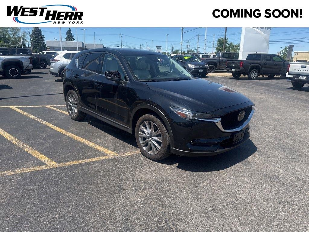 Used 2021 Jet Black Mazda Grand Touring image 1