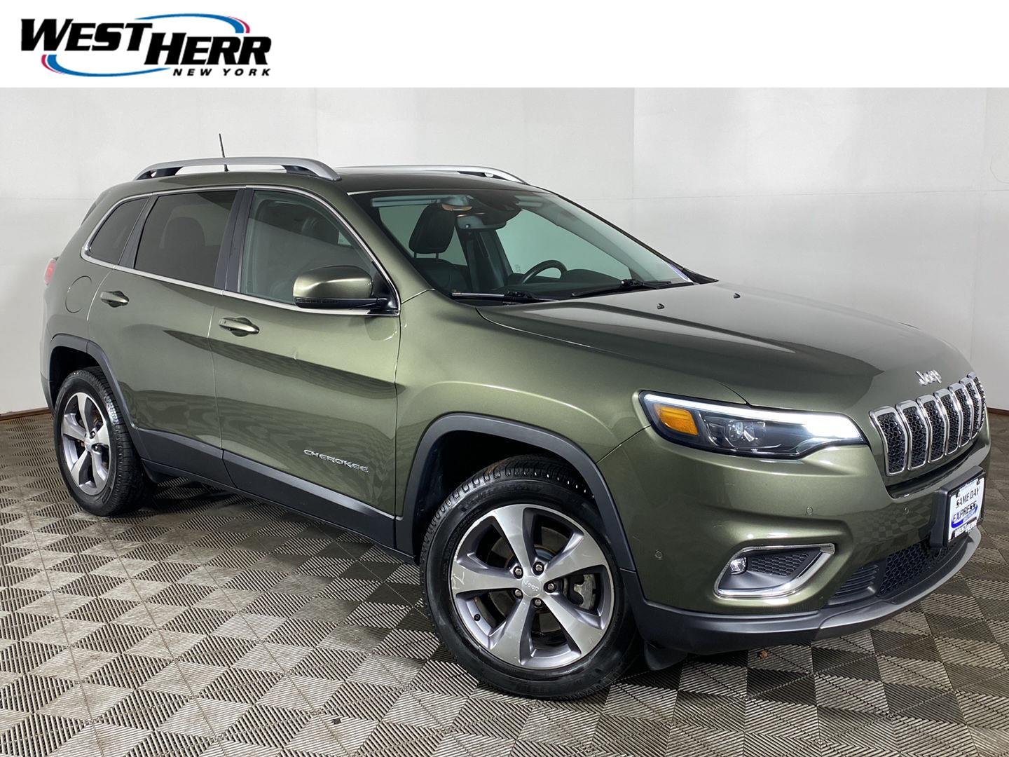Used 2021 Olive Green Pearlcoat Jeep Limited image 1