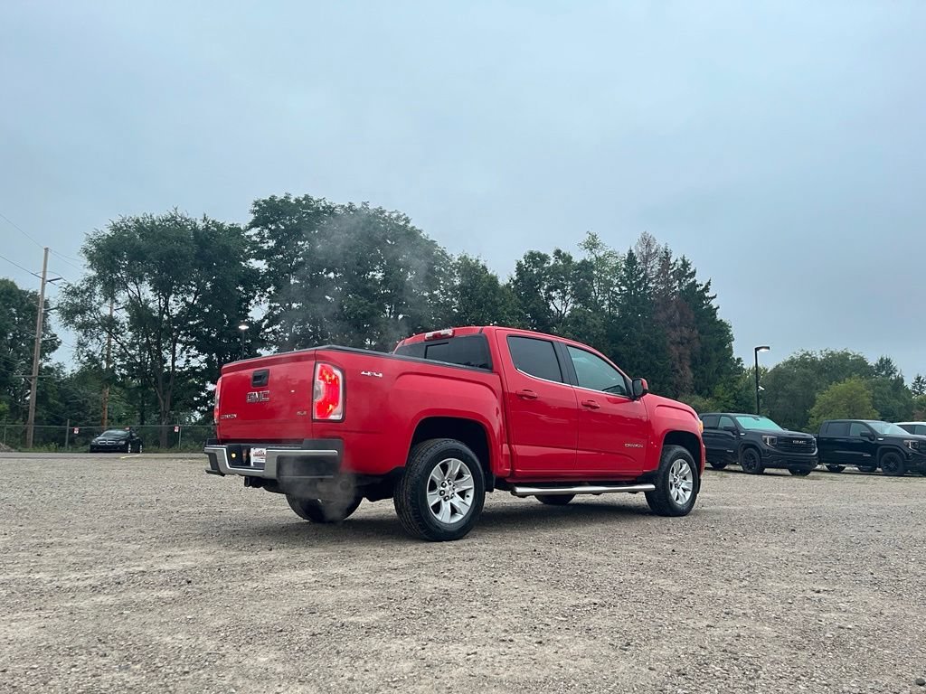 Used 2016 CARDINAL RED GMC 4WD SLE image 5