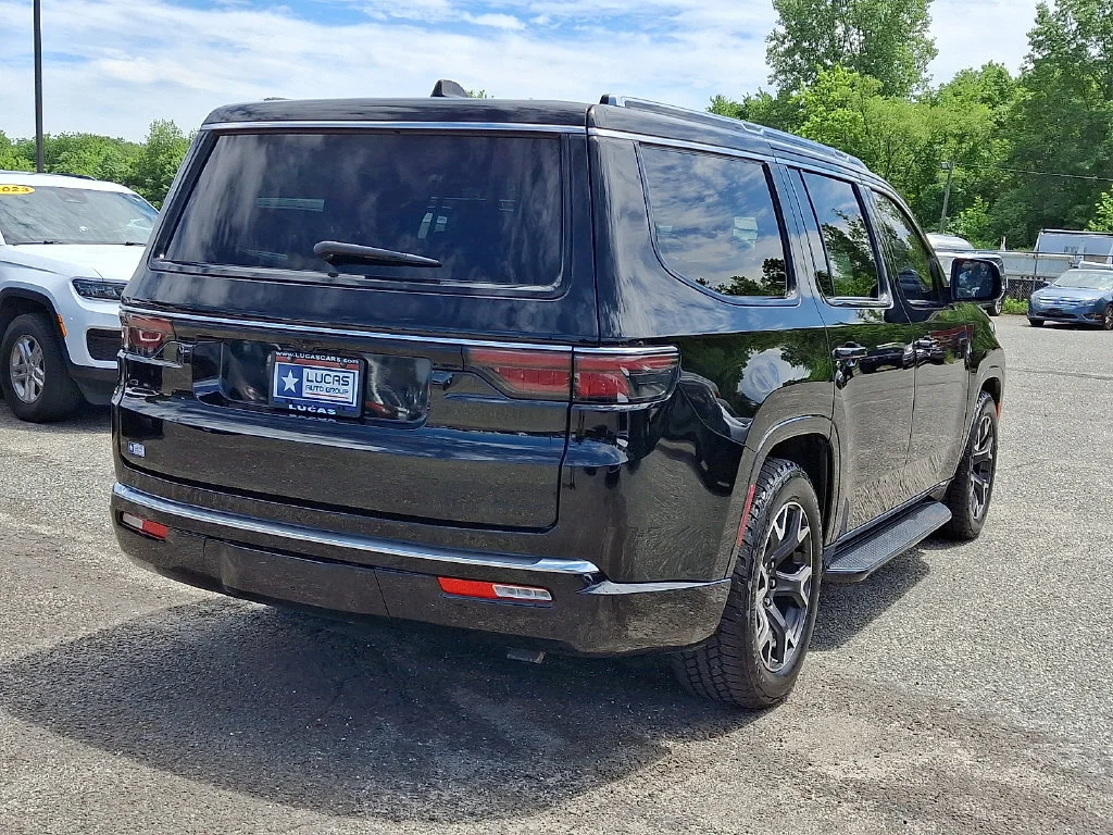 Used 2023 Diamond Black Crystal Pearlcoat Jeep Series III image 11