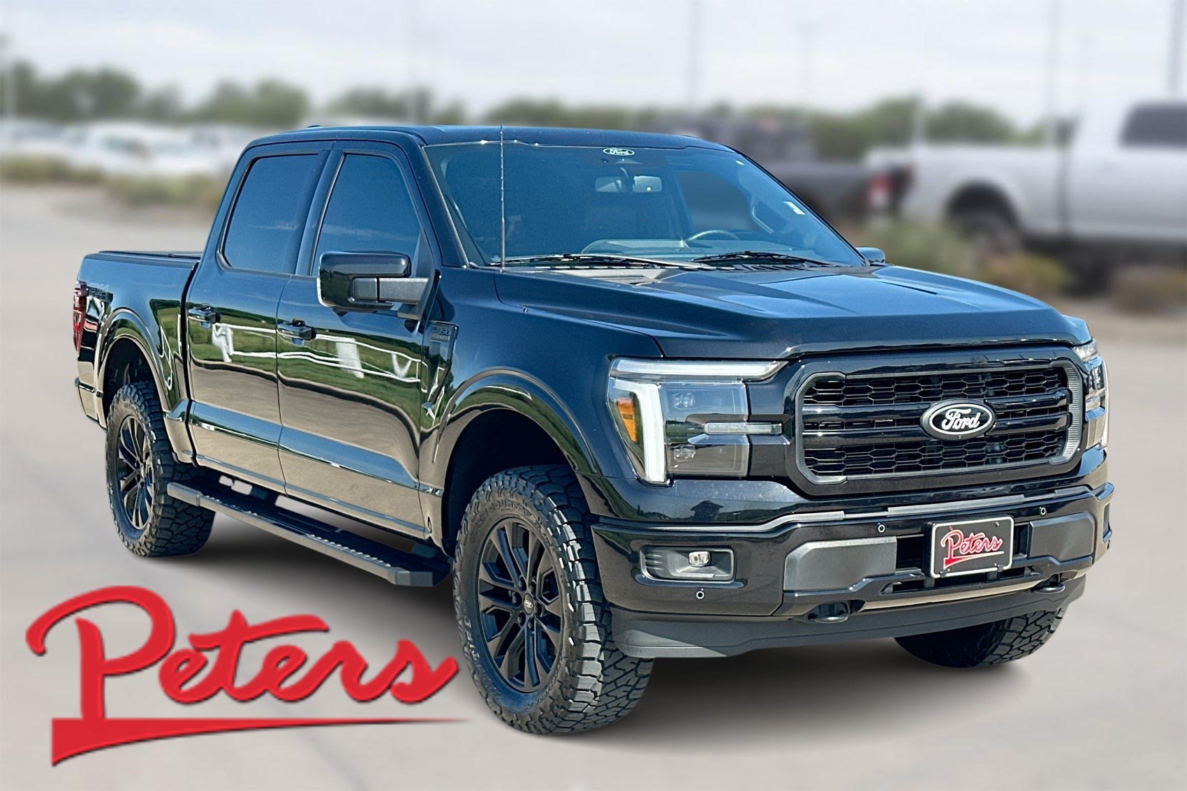 Used 2025 Black Metallic Ford LARIAT image 1