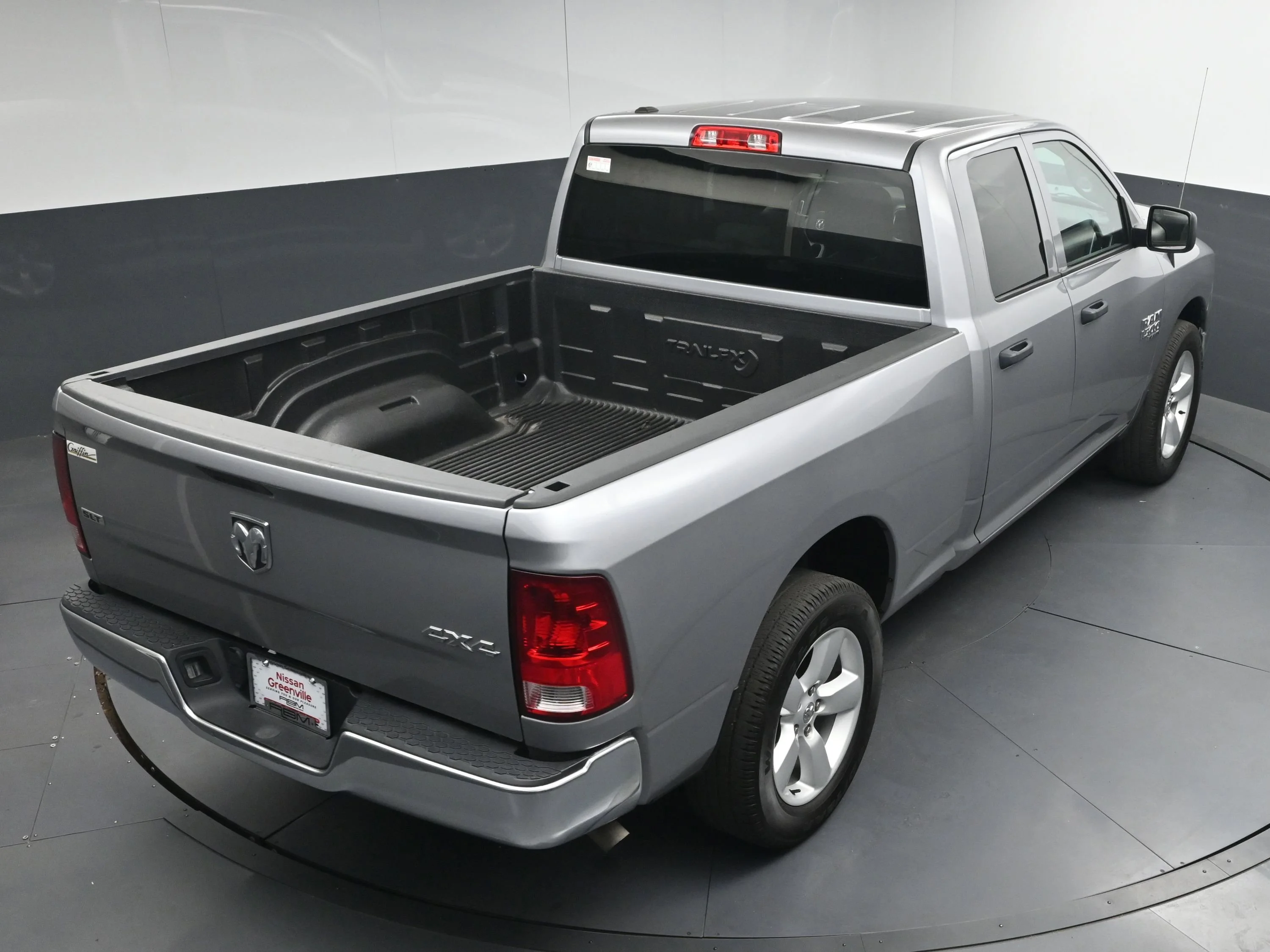 Used 2024 Billet Silver Metallic Clearcoat Ram SLT image 32