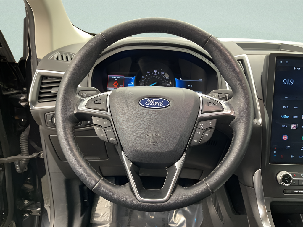 Used 2024 Black Metallic Ford Titanium AWD image 6