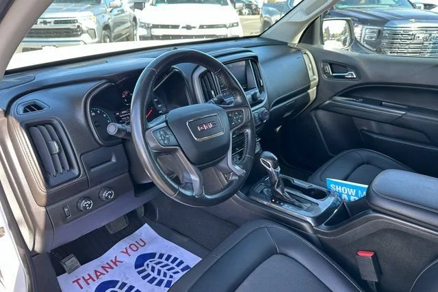 Used 2022 SUMMIT WHITE GMC 4WD AT4 w/Cloth image 13
