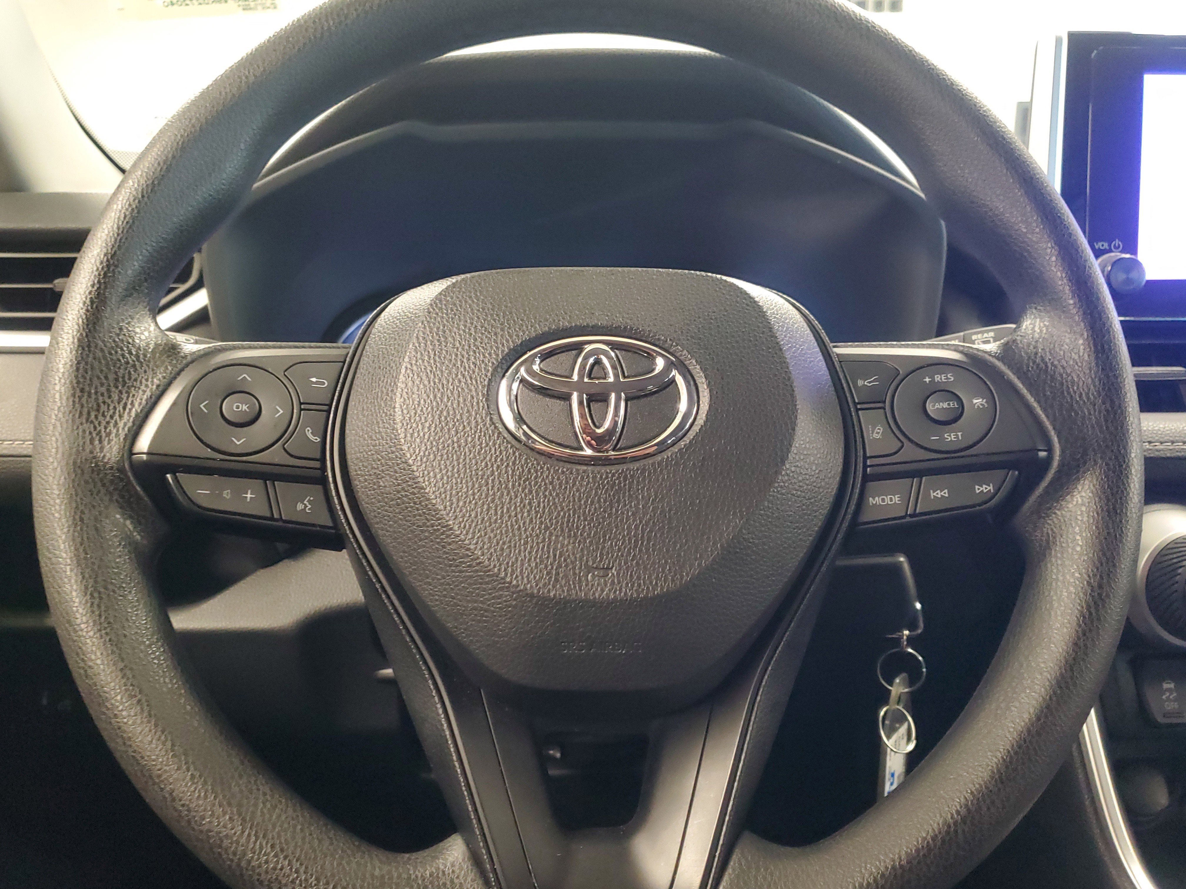 Used 2024 Midnight Black Metallic Toyota Hybrid LE image 19