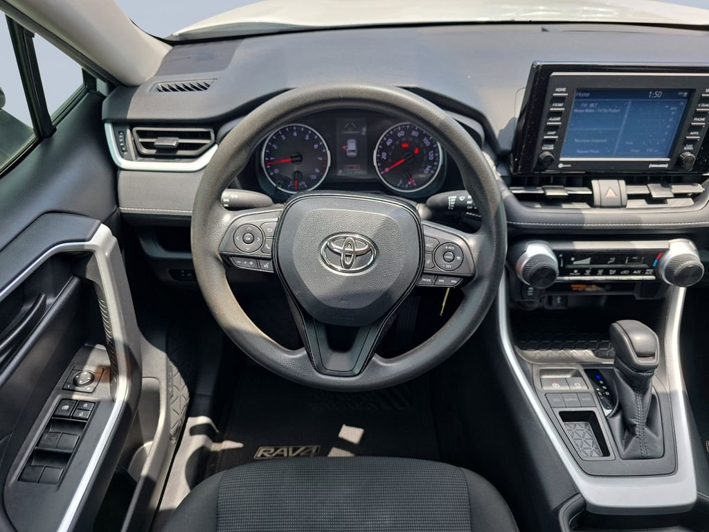 Used 2021 Super White Toyota LE image 13