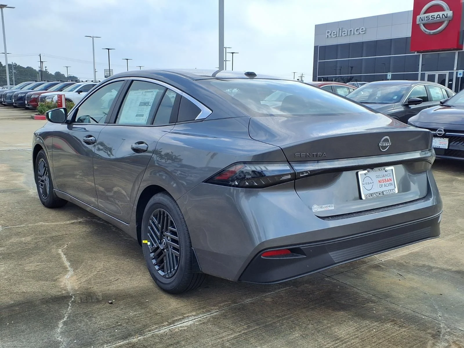 New 2026 Gun Metallic Nissan SV image 2