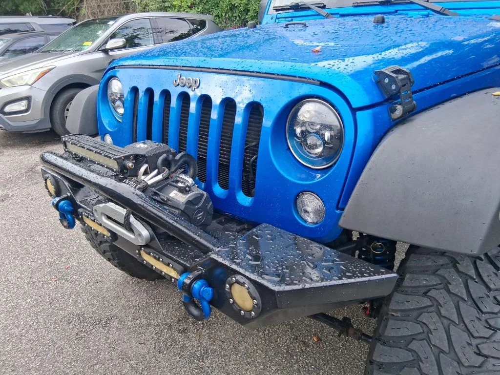 Used 2015 Blue Jeep Unlimited Sport image 9