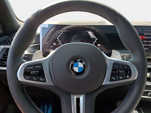 New 2026 Tanzanite Blue II Metallic BMW M60i image 18