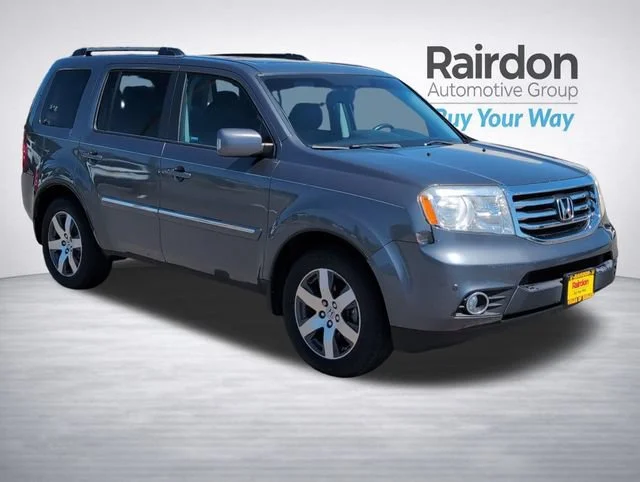 Used 2012 Polished Metal Metallic Honda Touring image 1