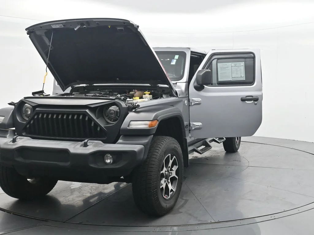 Used 2020 Billet Silver Metallic Clearcoat Jeep Sport image 39