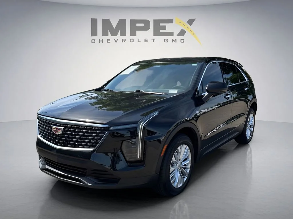 Used 2024 Stellar Black Metallic Cadillac Luxury image 1