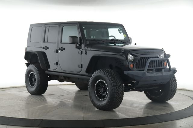 Used 2010 Jeep Wrangler Unlimited Sahara with VIN 1J4HA5H18AL140818 for sale in Findlay, OH