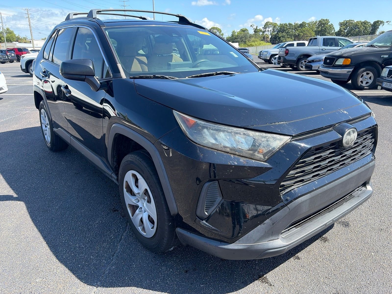 Used 2019 Black Toyota LE image 1