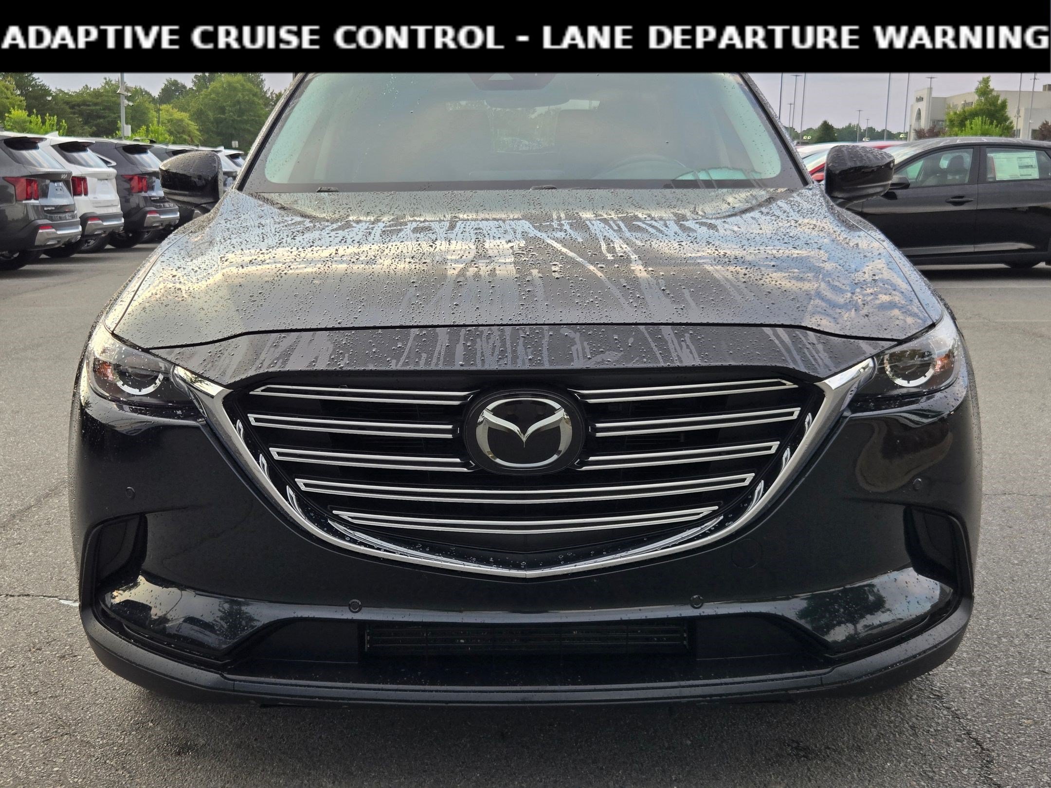 Used 2021 Jet Black Mica Mazda Touring image 2