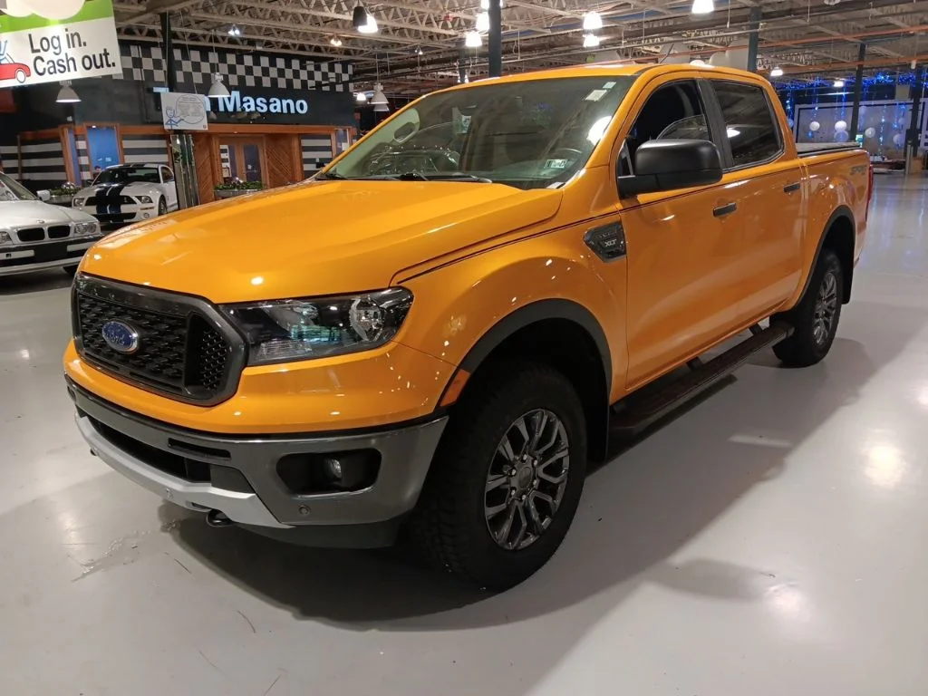 Used 2021 Orange Metallic Ford XLT image 1