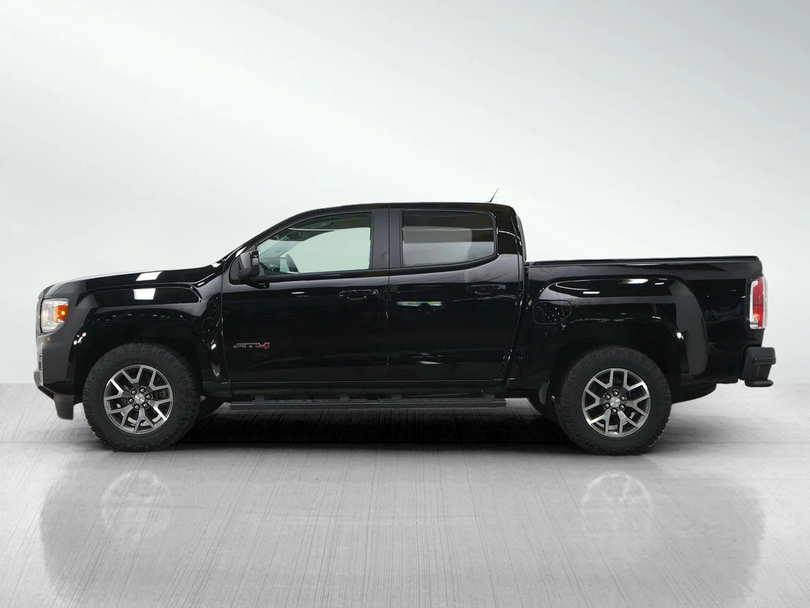 Used 2021 GMC Canyon AT4 with VIN 1GTG6FEN9M1216711 for sale in Bloomington, Minnesota