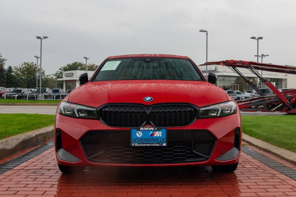Used 2024 Melbourne Red Metallic BMW 330e xDrive image 2