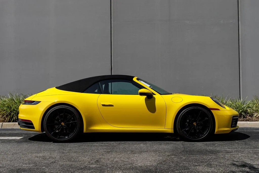 Used 2022 Racing Yellow Porsche Carrera image 6