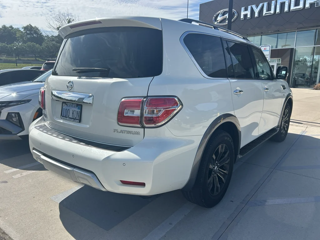 Used 2017 Pearl White Nissan Platinum image 4