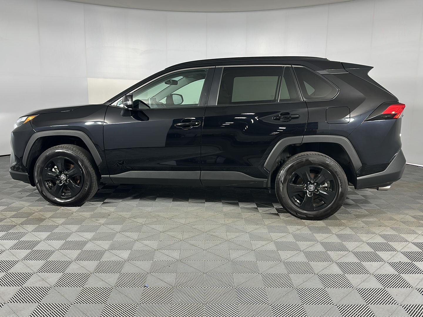 Used 2024 Midnight Black Metallic Toyota XLE image 4