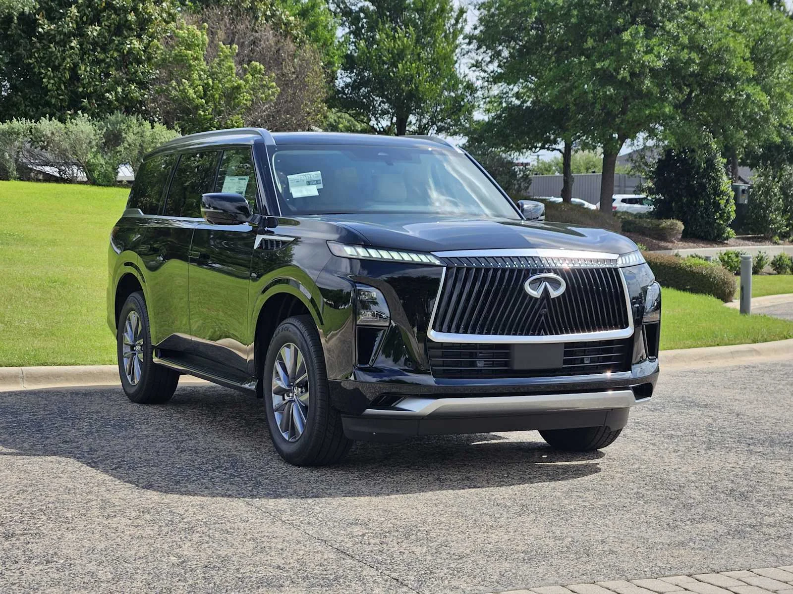 New 2026 BLACK OBSIDIAN INFINITI Pure 2WD image 2