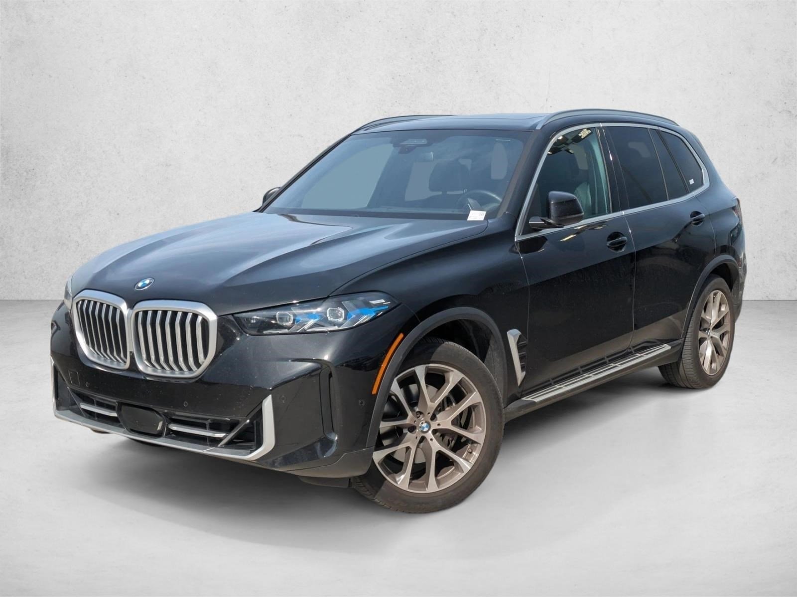 Used 2024 Black Sapphire Metallic BMW xDrive40i image 1