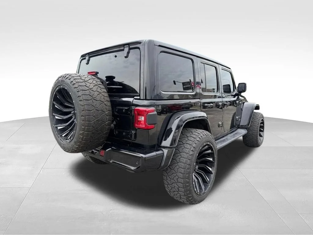 Used 2021 Black Jeep Unlimited Sahara image 5
