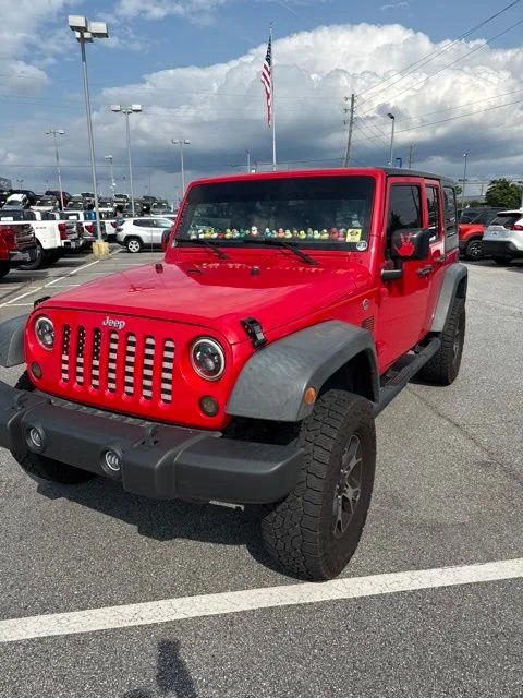 Used 2016 Firecracker Red Clearcoat Jeep Unlimited Sport image 3