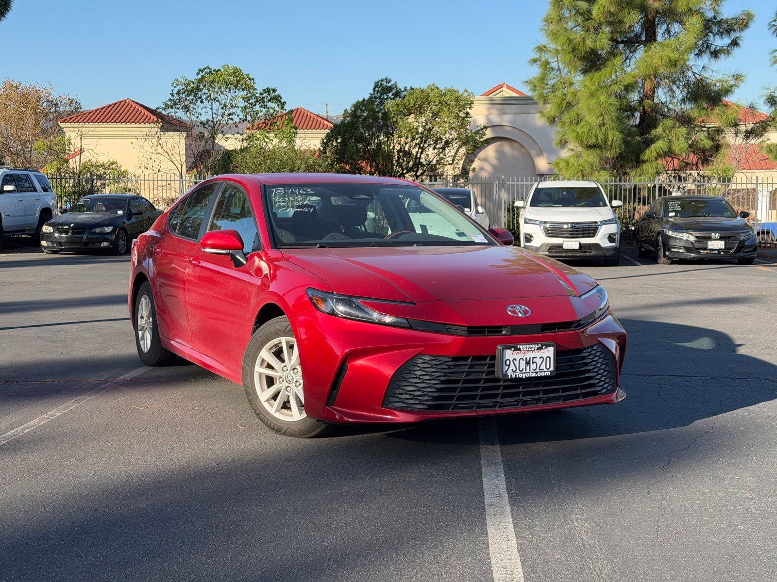 Certified Used 2025 Red Toyota LE image 1