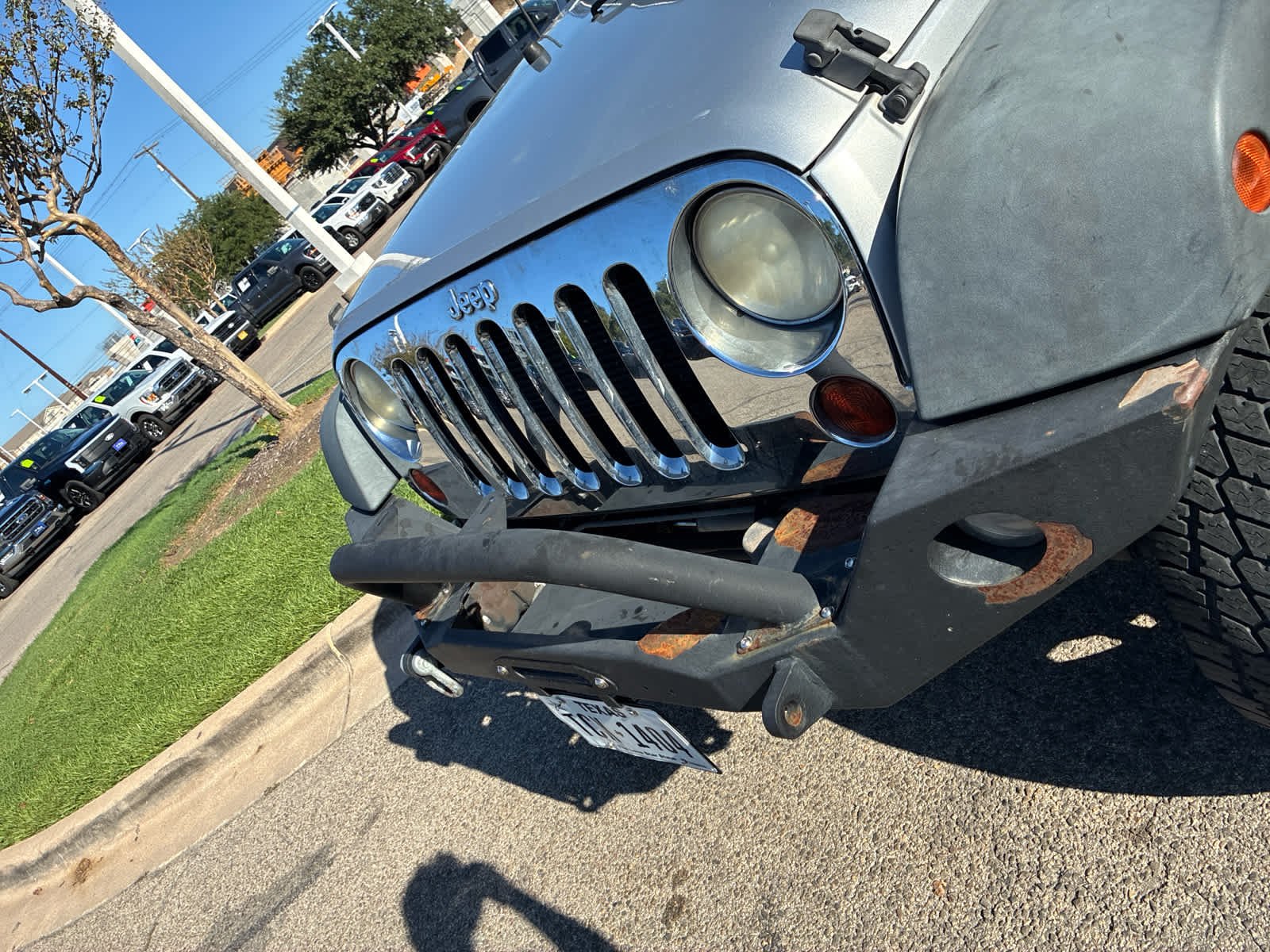 Used 2012 Bright Silver Metallic Jeep Sport image 3