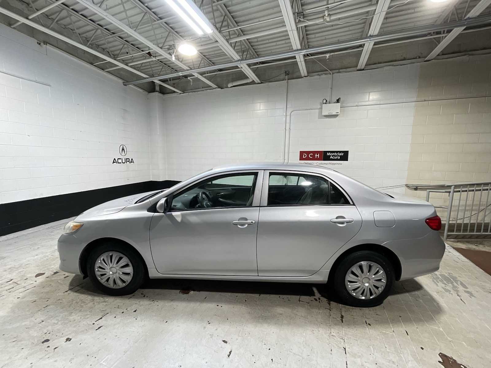 Used 2010 Classic Silver Metallic Toyota LE image 3