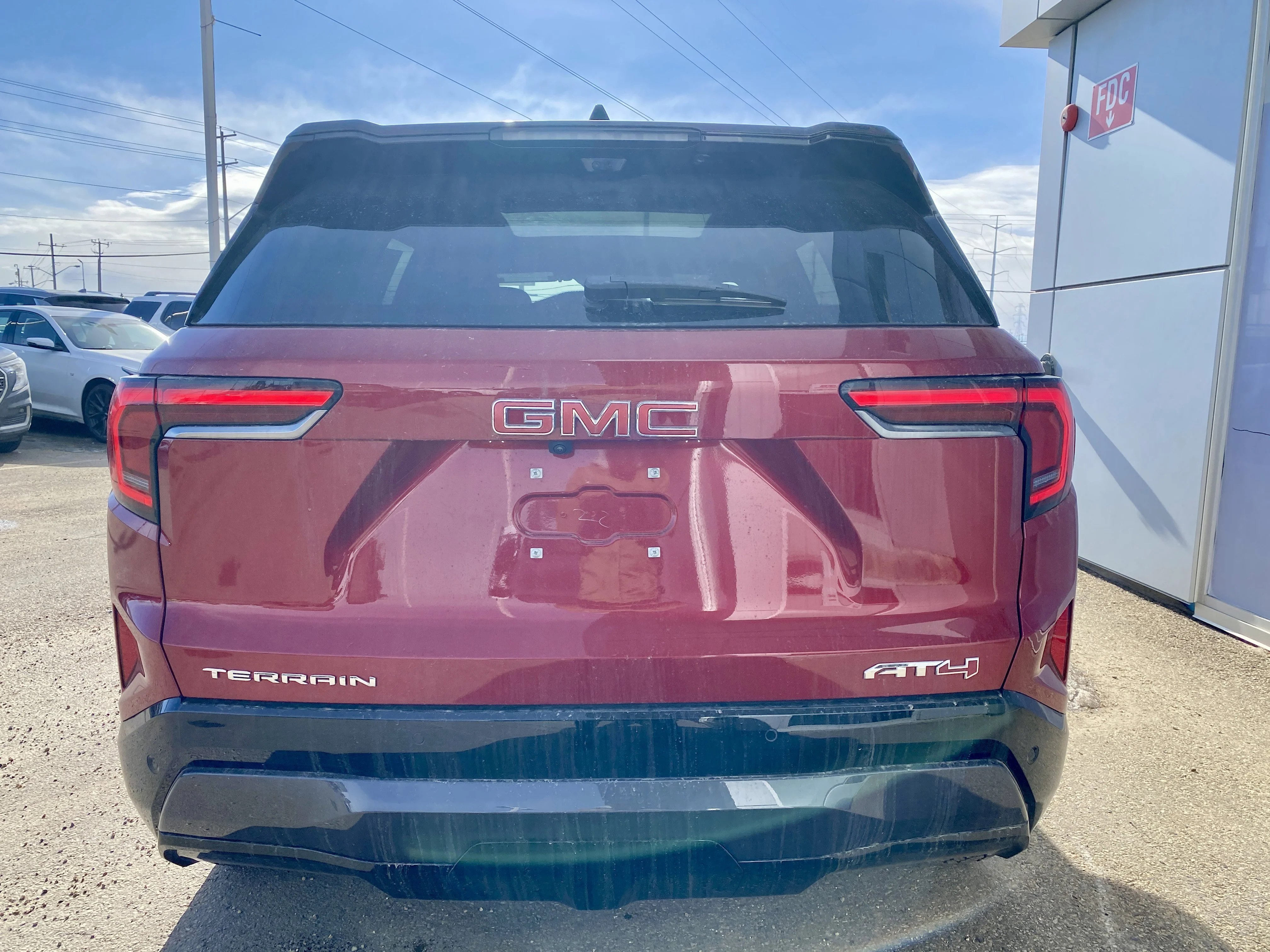 New 2026 VOLCANIC RED TINTCOAT GMC AWD AT4 image 5