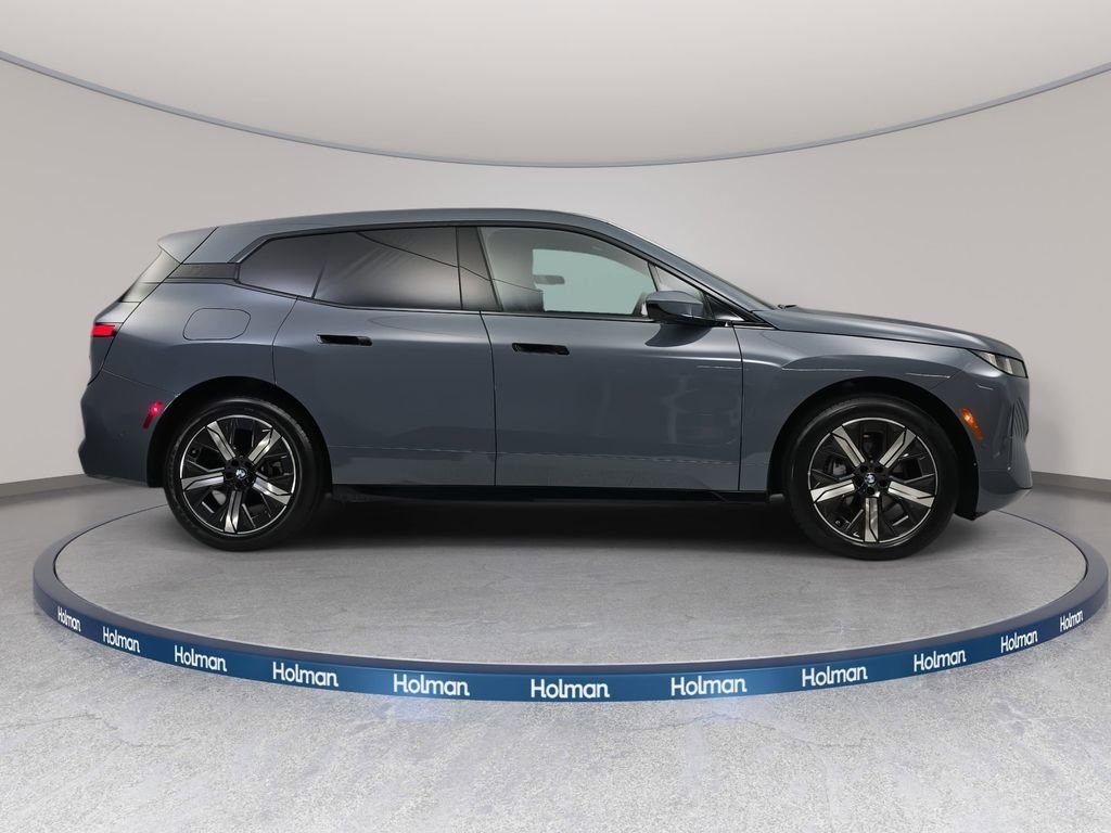 Used 2026 Storm Bay Metallic BMW xDrive60 image 4