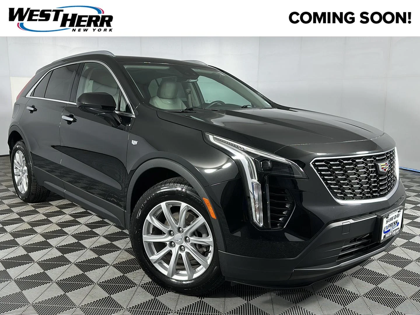 Used 2022 Stellar Black Metallic Cadillac AWD Luxury image 1