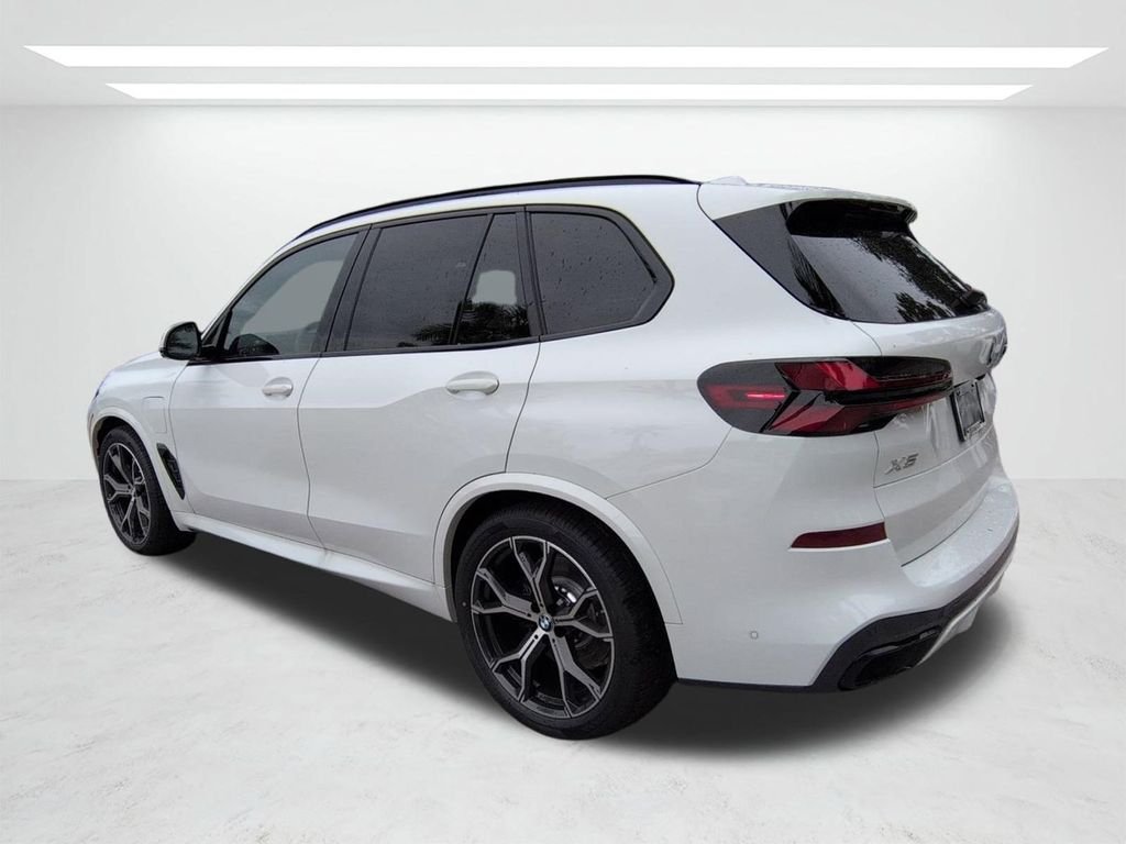 New 2026 Alpine White BMW xDrive50e image 6