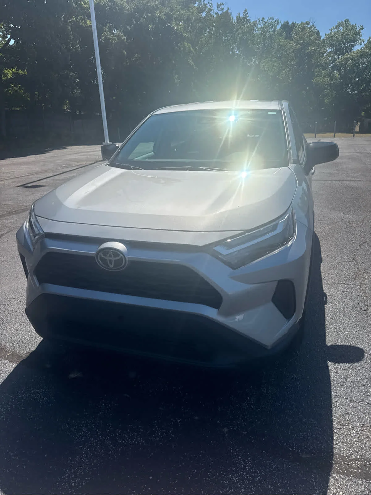 Used 2024 Silver Sky Metallic Toyota LE image 3