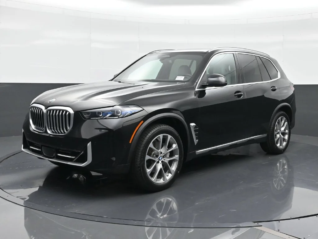 Certified Used 2025 Black BMW sDrive40i image 1