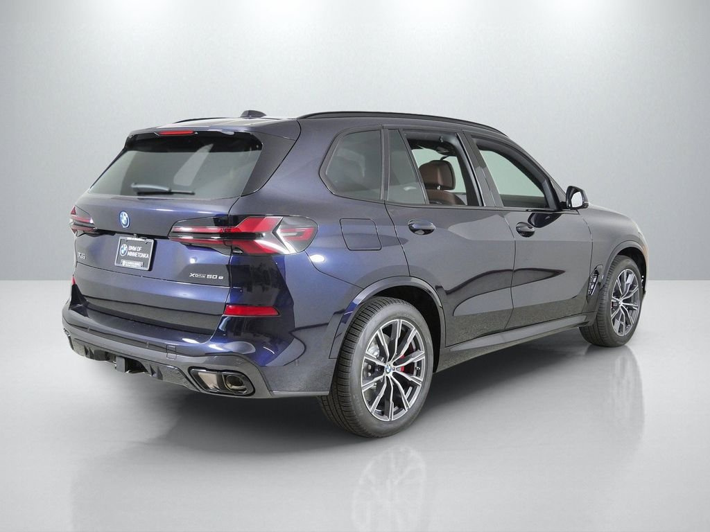 New 2026 Carbon Black Metallic BMW xDrive50e image 9