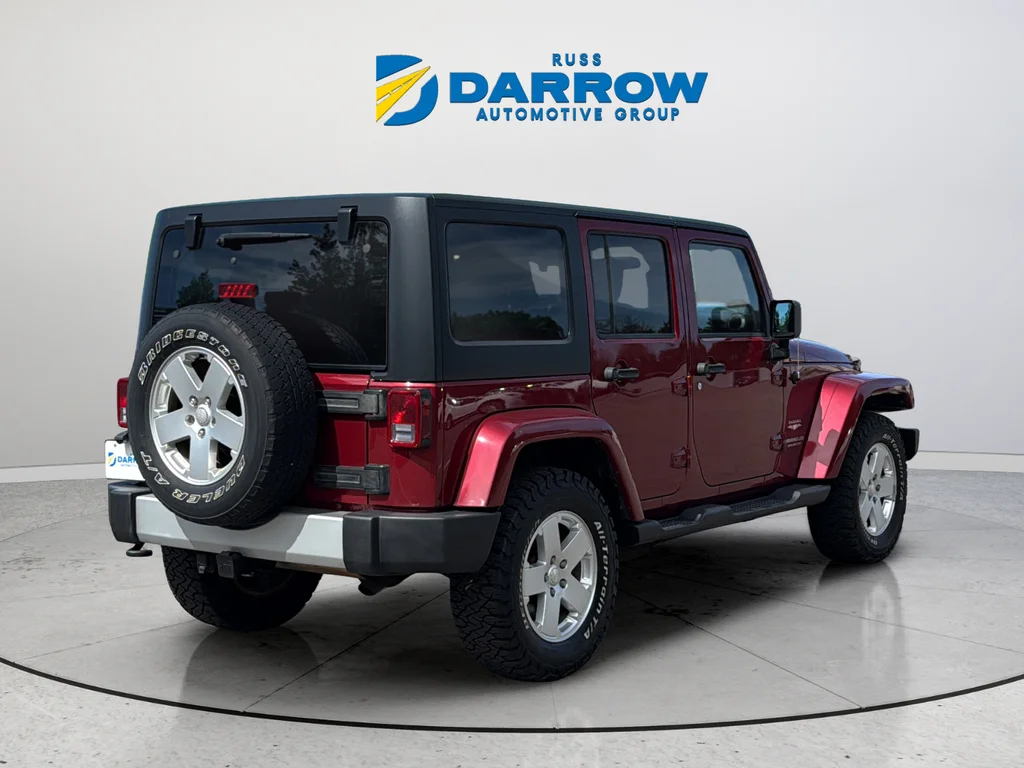 Used 2012 Red Jeep Unlimited Sahara image 5