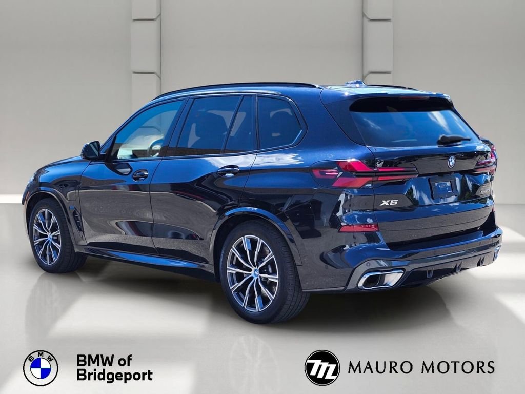 Used 2025 Black BMW xDrive50e image 4