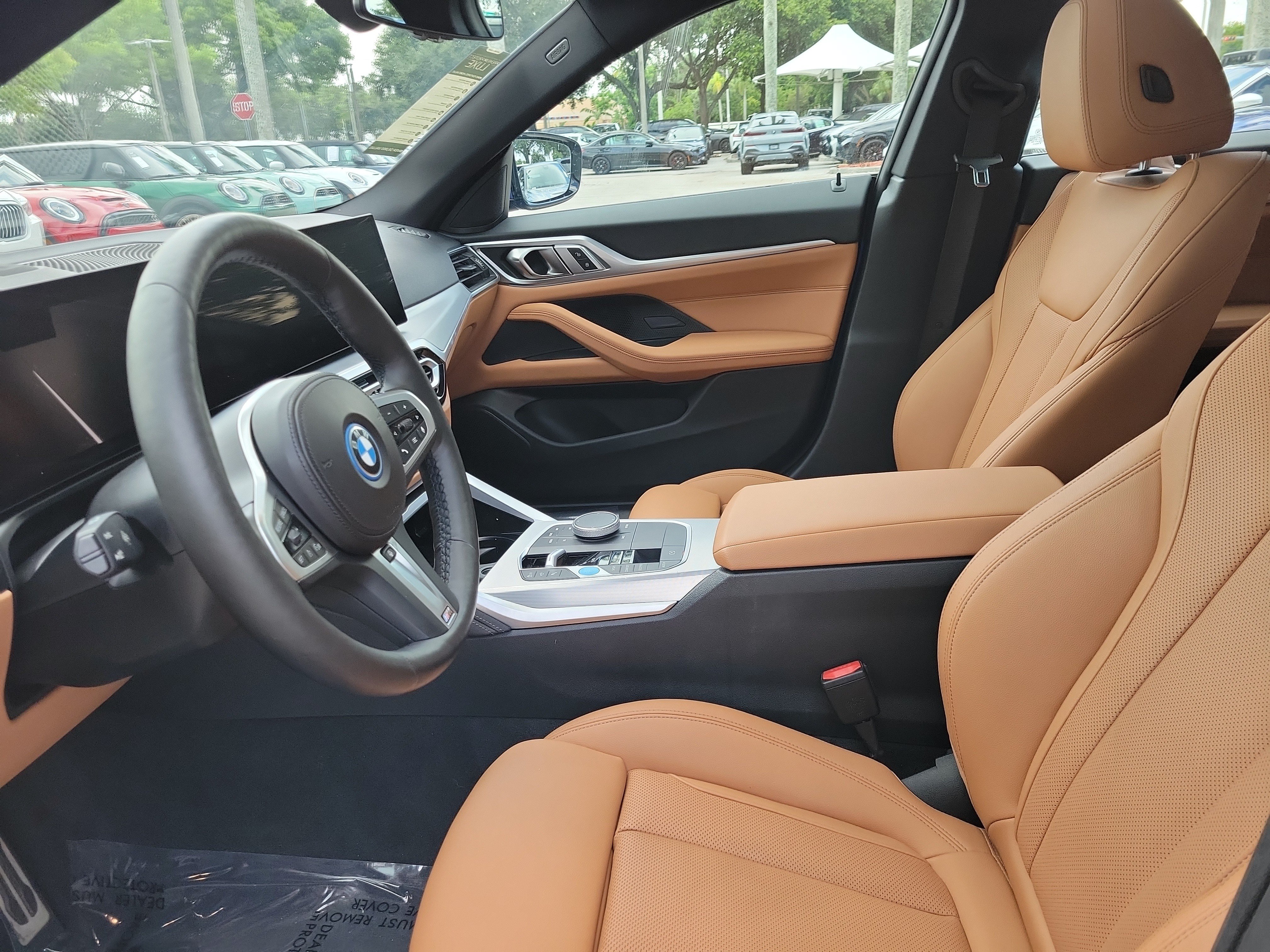 Certified Used 2024 Portimao Blue Metallic BMW eDrive40 image 12