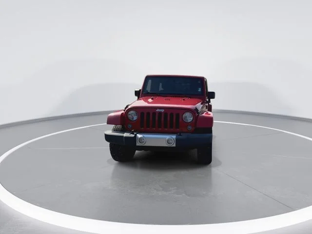 Used 2014 Red Jeep Unlimited Sahara image 3