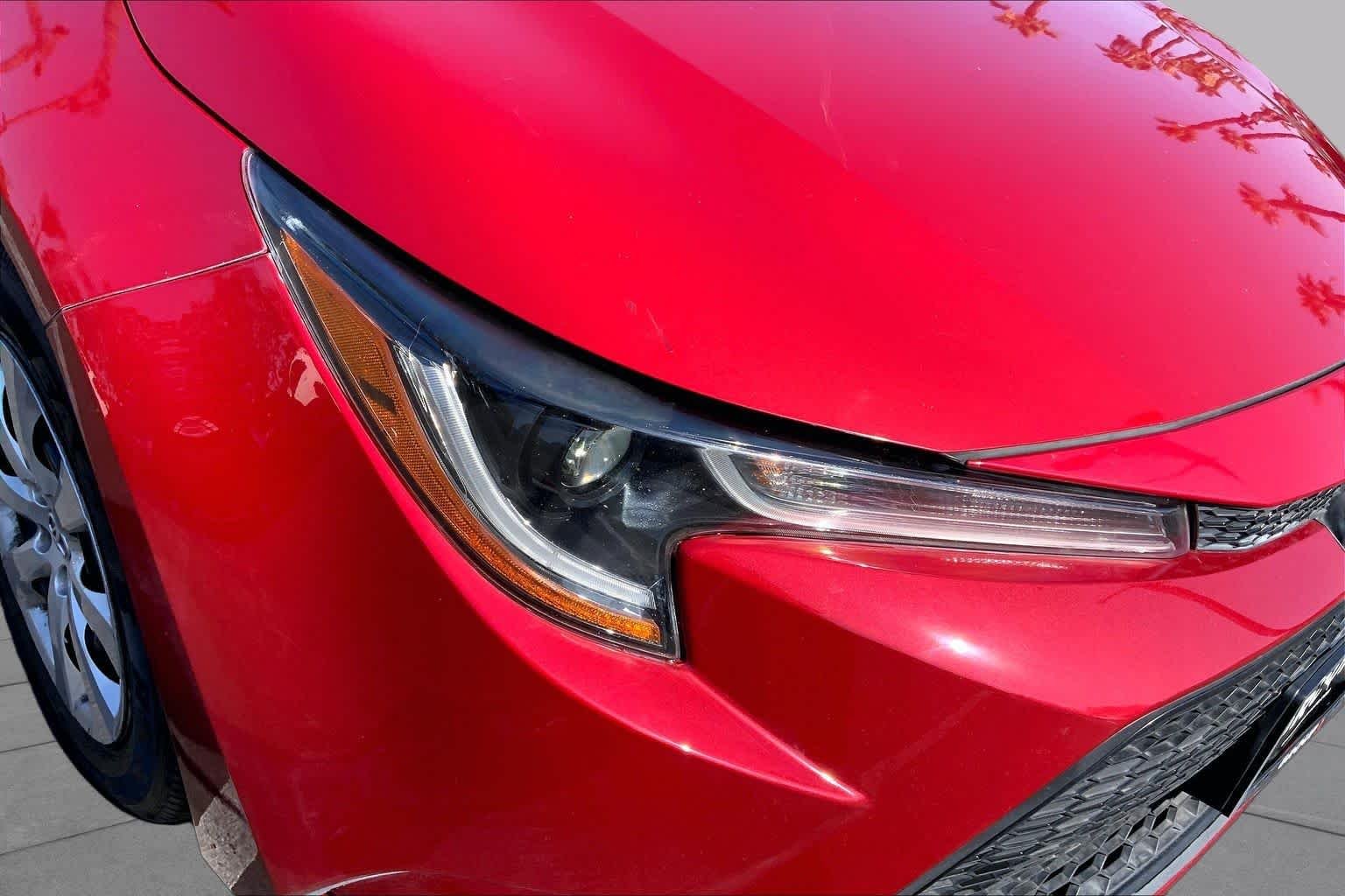 Used 2021 Barcelona Red Metallic Toyota LE image 27