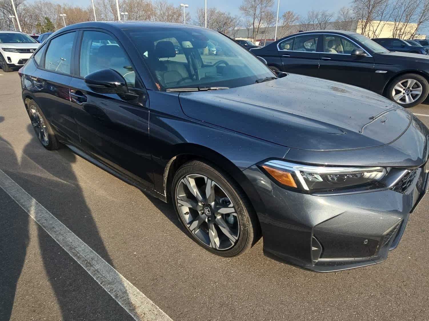 Certified 2026 Honda Civic Hatchback Sport Touring with VIN 19XFL4H90TE002404 for sale in Hopkins, Minnesota