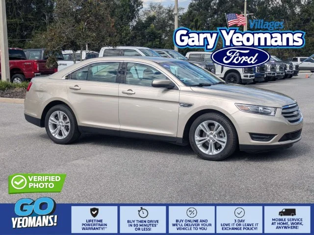 Used 2017 Gold Ford SEL image 1