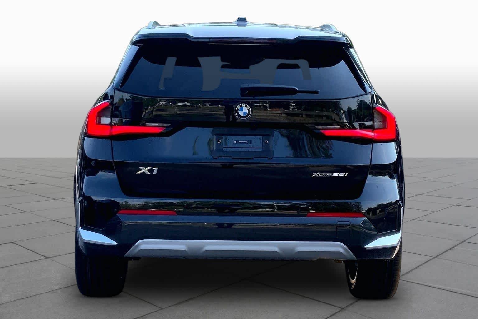 New 2027 Black Sapphire Metallic BMW xDrive28i image 4