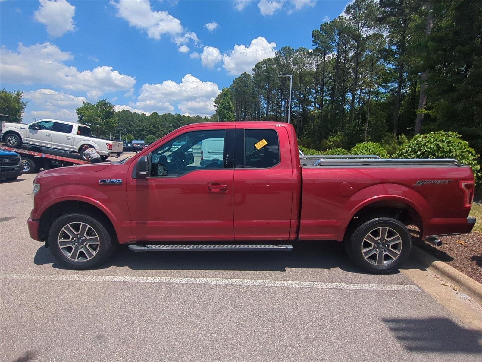 Used 2016 Ruby Red Metallic Tinted Clearcoat FORD  image 5