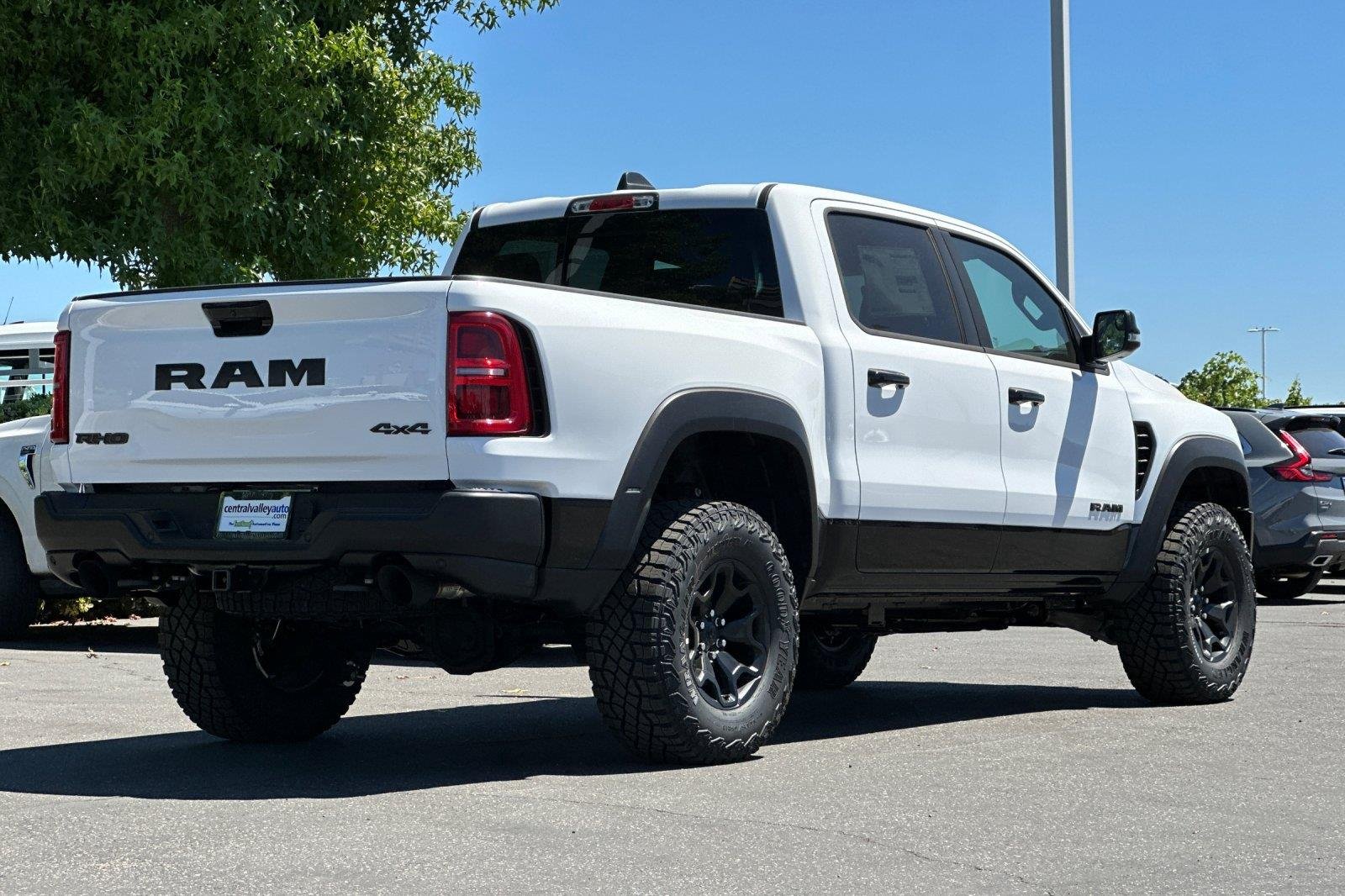 New 2026 Bright White Clearcoat Ram RHO image 4