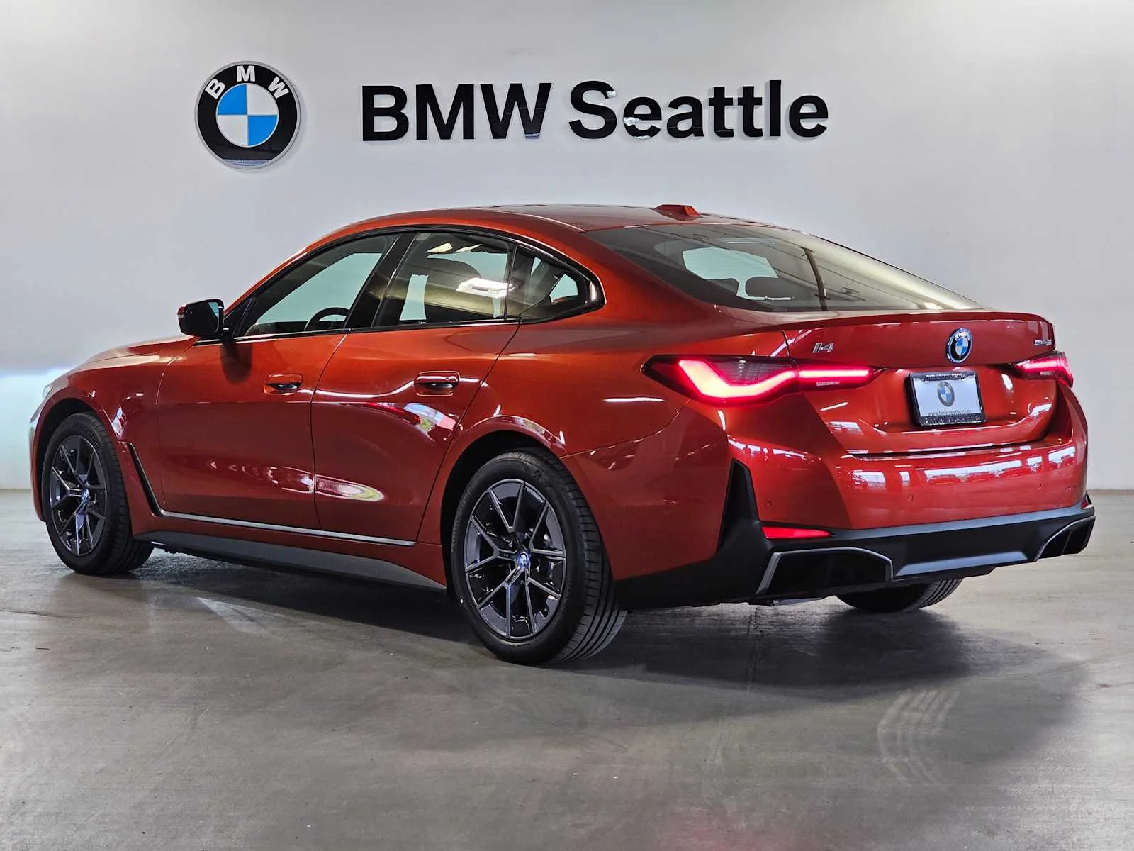 Certified Used 2023 Sunset Orange Metallic BMW eDrive35 image 4